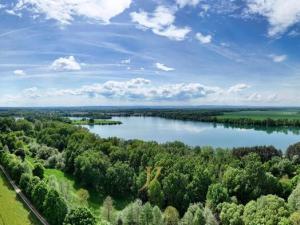 Prodej pozemku pro bydlení, Olomouc - Chomoutov, 7945 m2