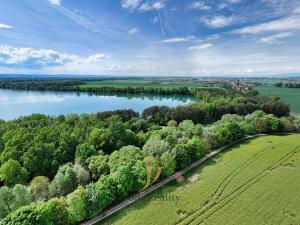 Prodej pozemku pro bydlení, Olomouc - Chomoutov, 7945 m2