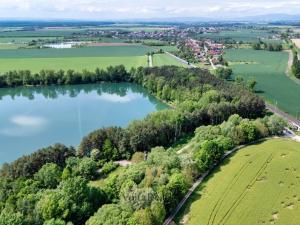 Prodej pozemku pro bydlení, Olomouc - Chomoutov, 7945 m2