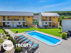 Prodej apartmánu, Milovice, 255 m2