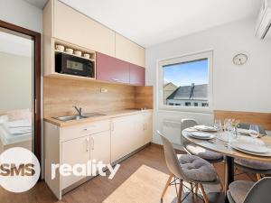 Prodej apartmánu, Milovice, 255 m2