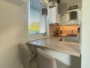 Pronájem bytu 2+kk, Praha - Ruzyně, Zbuzanská, 37 m2