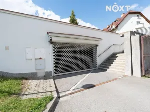 Prodej podílu garážového stání, Brno, Högrova, 11 m2